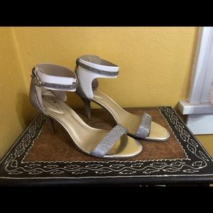 NEW Bandolier silver heels - size 9.5 - New in box